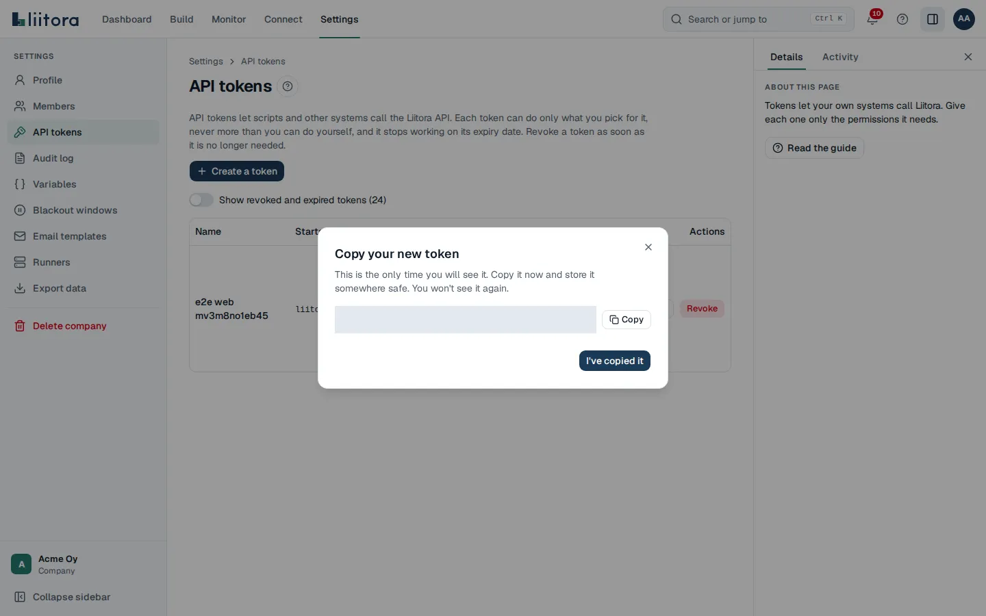 The API tokens tab: a table of tokens with their name, first characters, access, status, dates and a Revoke button